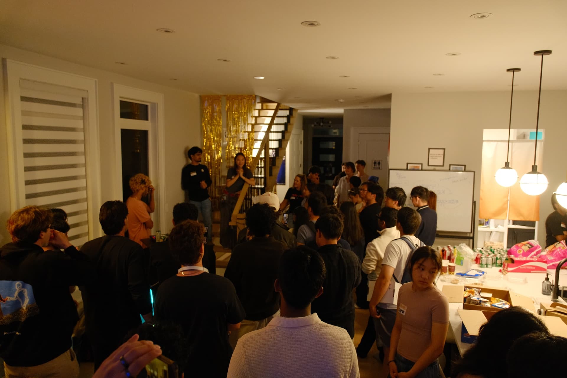 Sunny speaking to a room full of event attendees