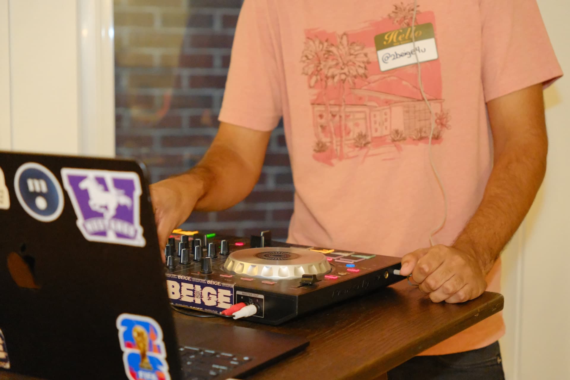 A DJ playing music at the event